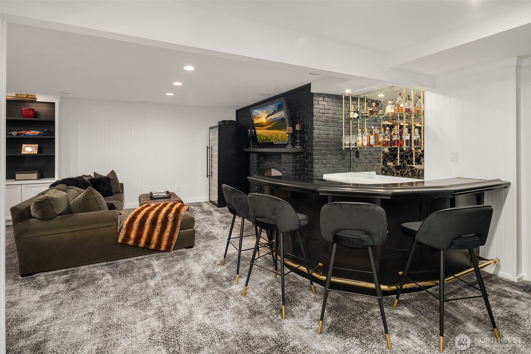 1601 Evergreen Point Road Medina, WA 98039 - Photo 29 of 40 a living room with furniture and a flat screen tv