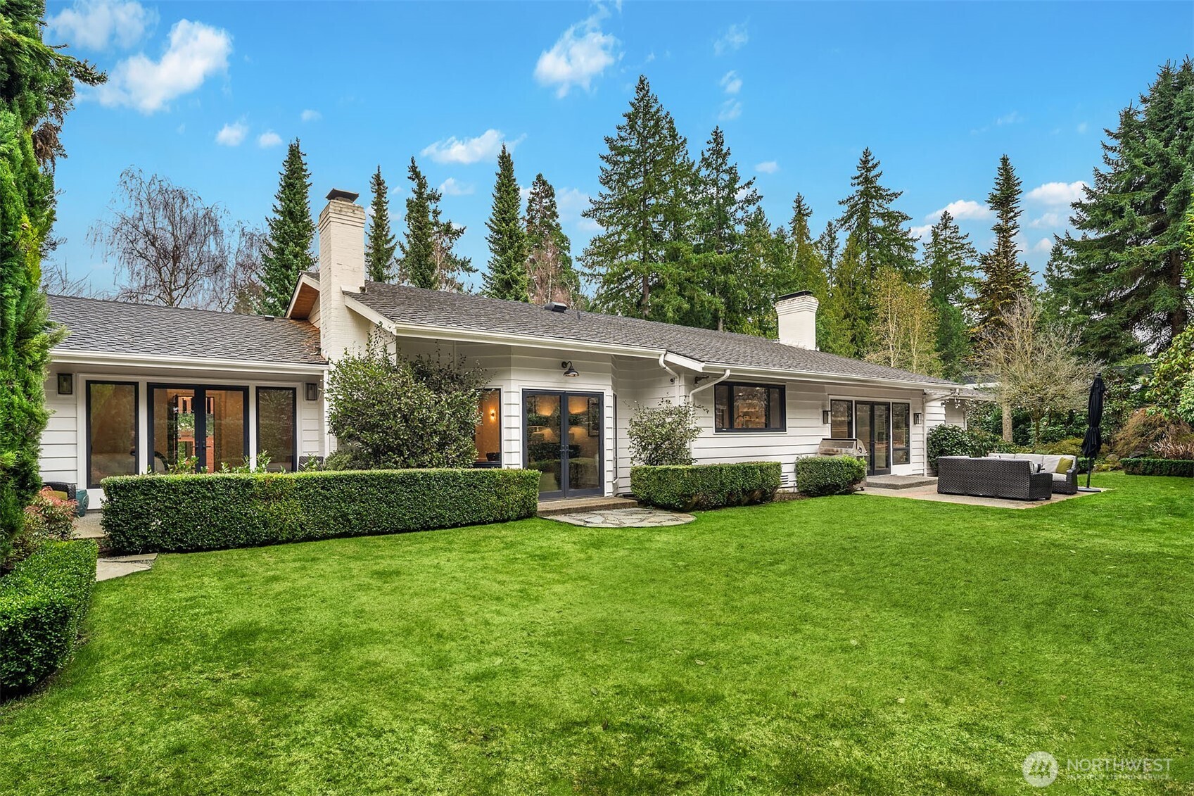 1601 Evergreen Point Road Medina, WA 98039 - Photo 35 of 40 a view of a house with a yard and sitting area