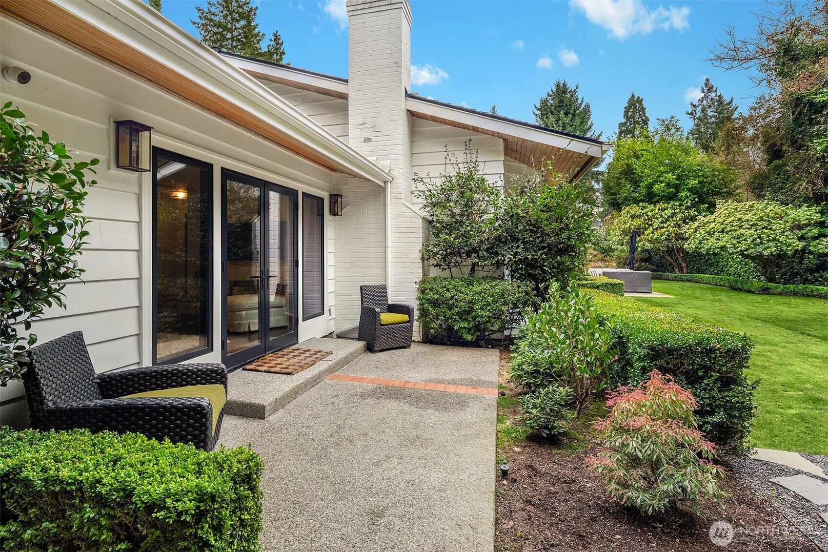 1601 Evergreen Point Road Medina, WA 98039 - Photo 36 of 40 front view of a house with a yard