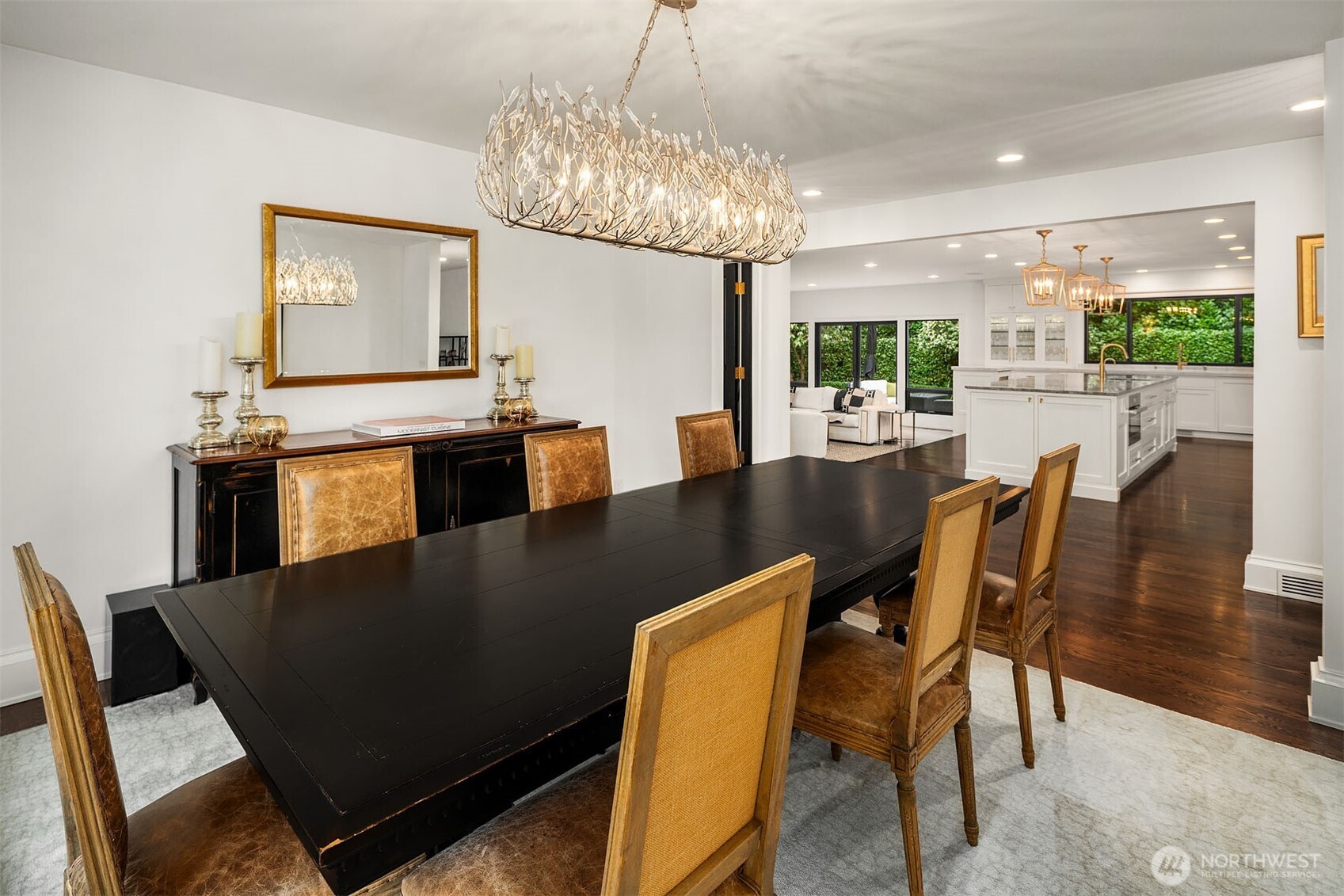 1601 Evergreen Point Road Medina, WA 98039 - Photo 9 of 40 a view of a dining room with furniture window and wooden floor