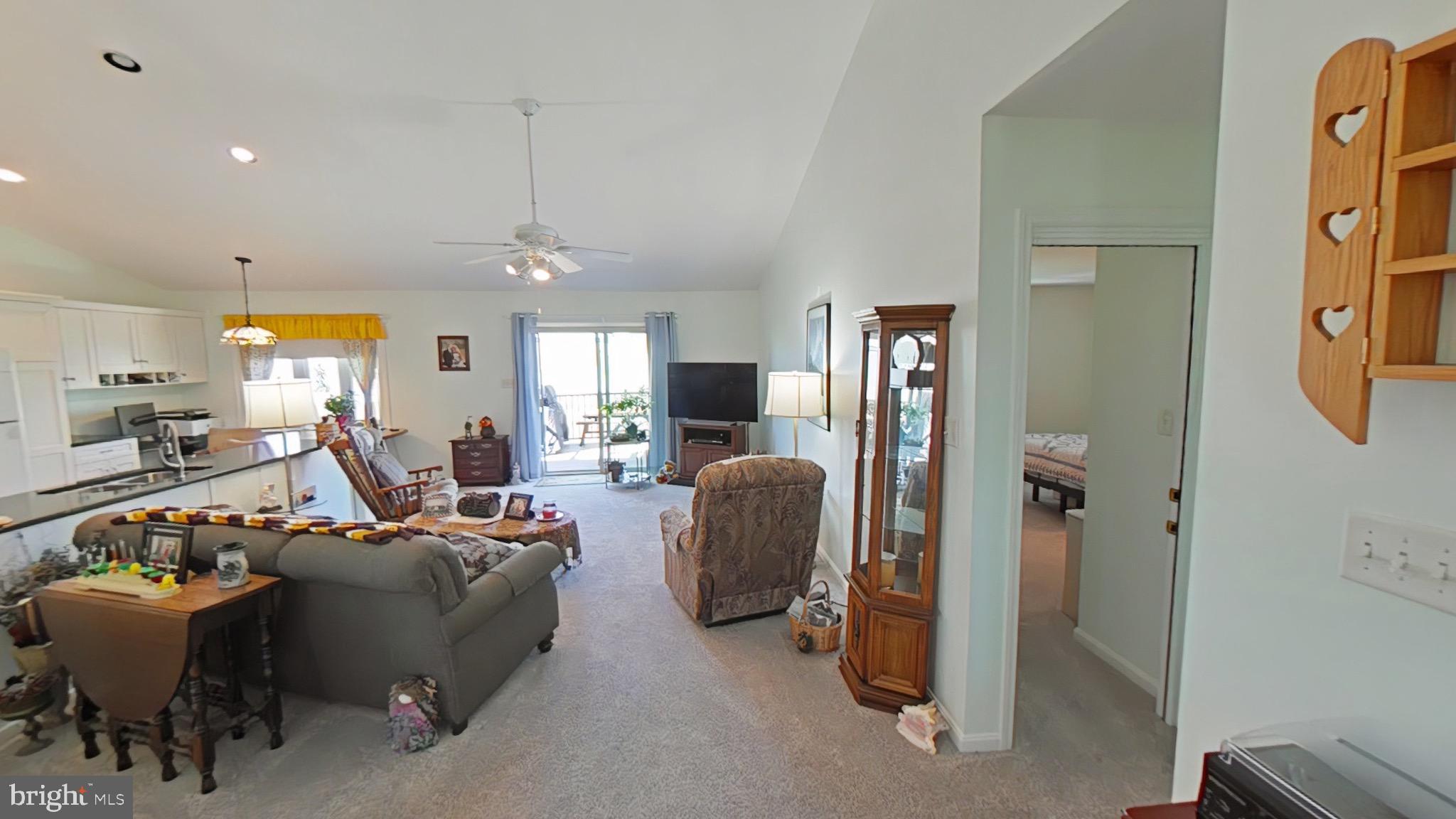 35 Duffield Drive Lititz, PA 17543 - Photo 2 of 15 a living room with furniture a flat screen tv and a large window