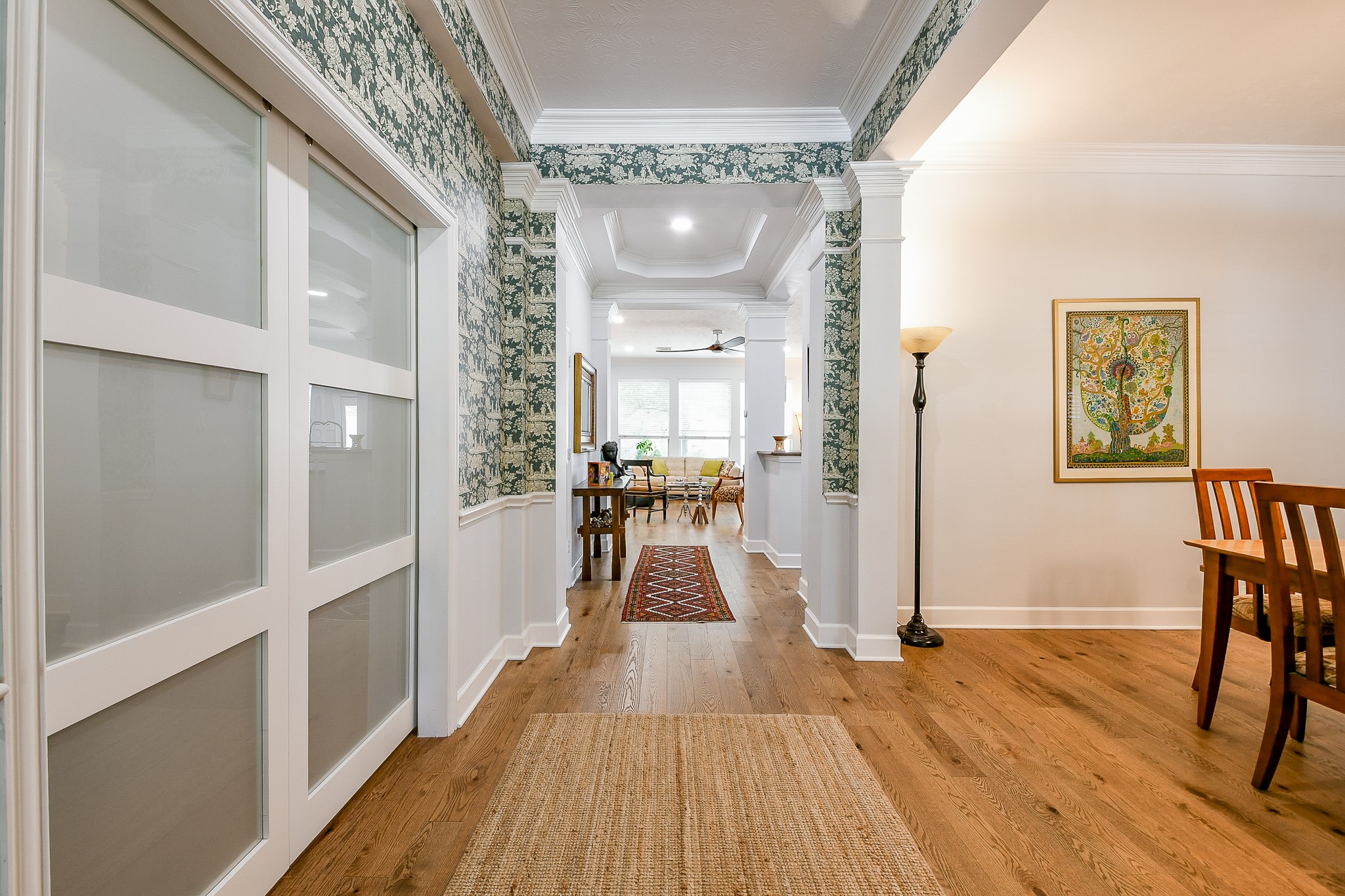 2442 Chimney Rock Road Houston, TX 77057 - Photo 11 of 50 a view of a room with wooden floor and furniture
