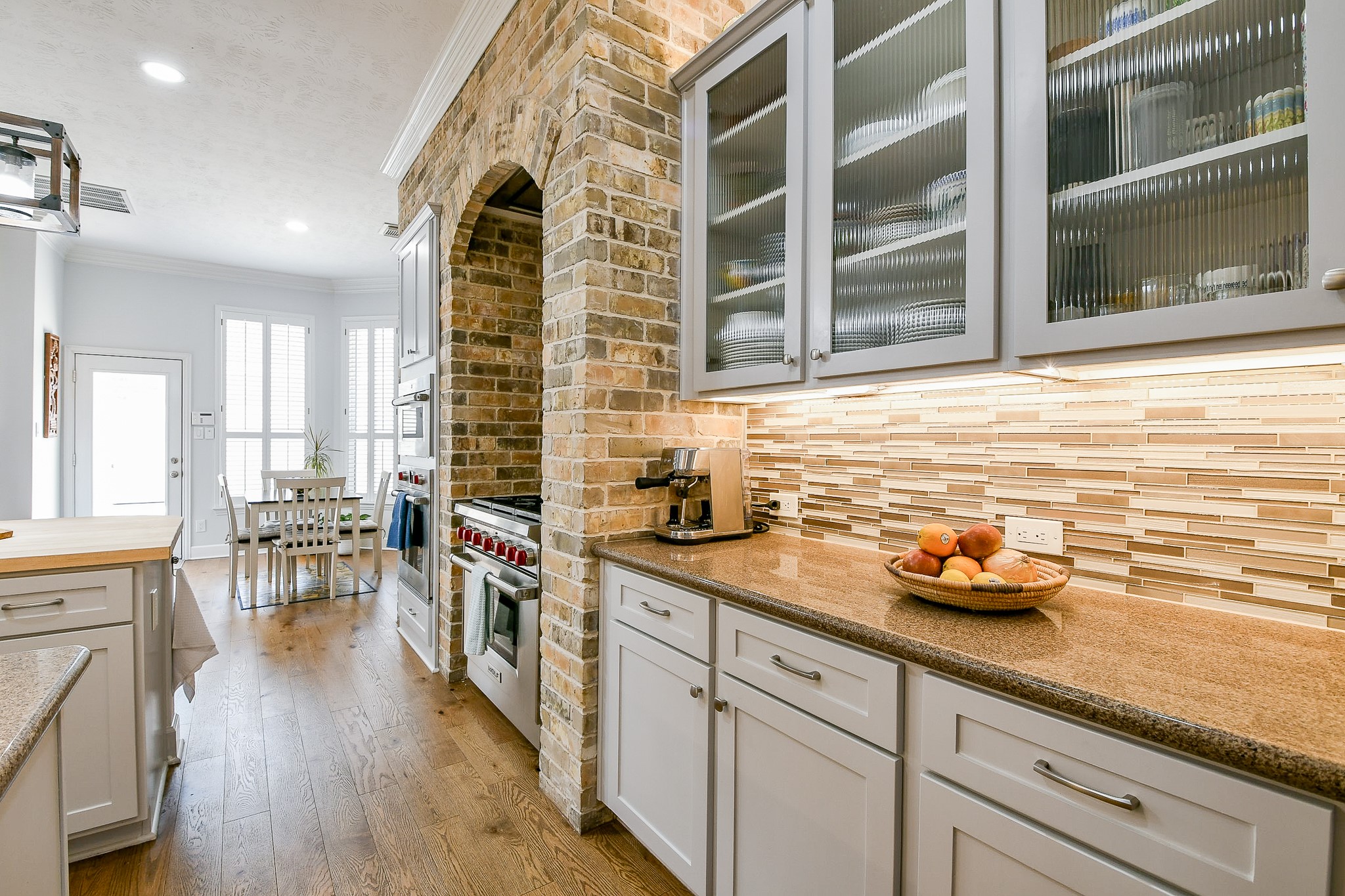 2442 Chimney Rock Road Houston, TX 77057 - Photo 13 of 50 a kitchen with a sink and cabinets