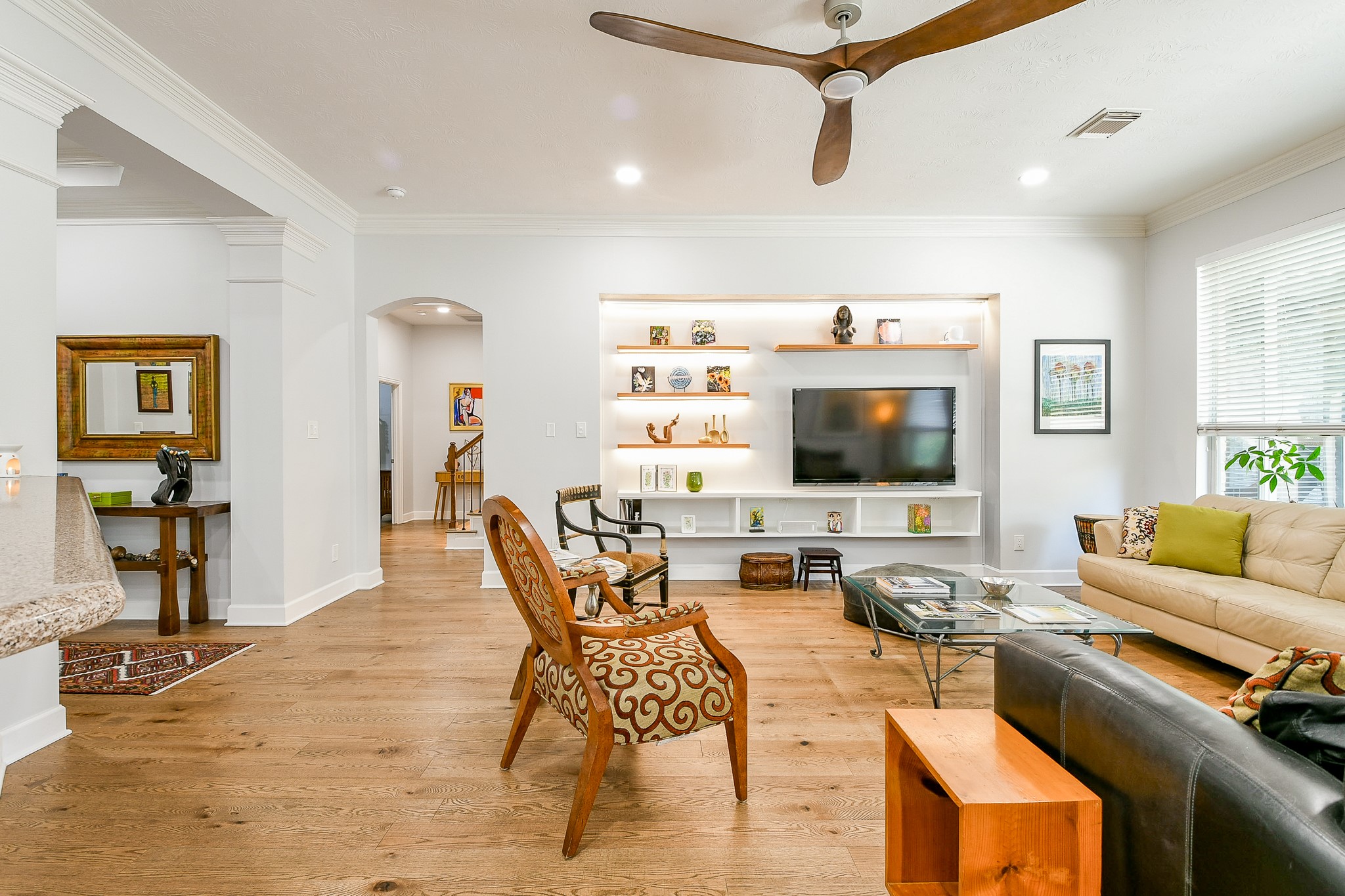 2442 Chimney Rock Road Houston, TX 77057 - Photo 20 of 50 a living room with furniture and a flat screen tv