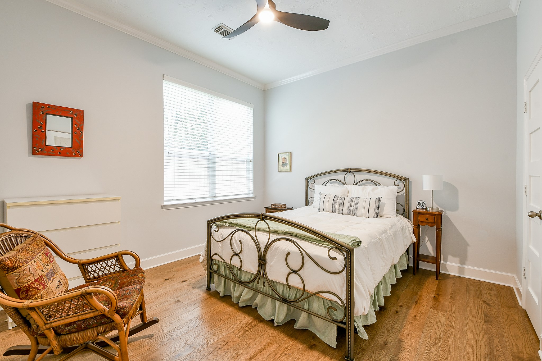 2442 Chimney Rock Road Houston, TX 77057 - Photo 36 of 50 a bedroom with a bed and window