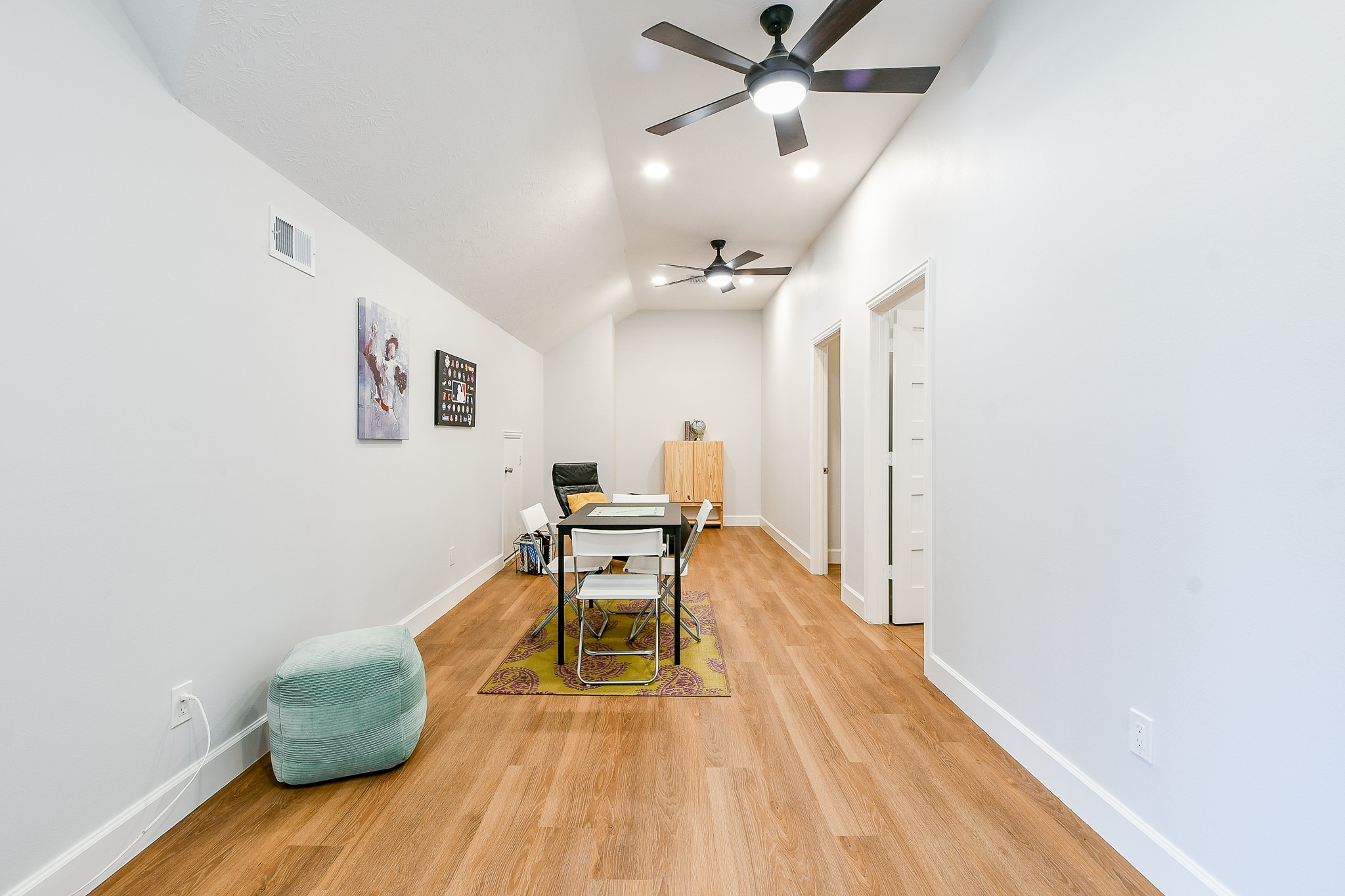 2442 Chimney Rock Road Houston, TX 77057 - Photo 42 of 50 a living room with furniture and a wooden floor