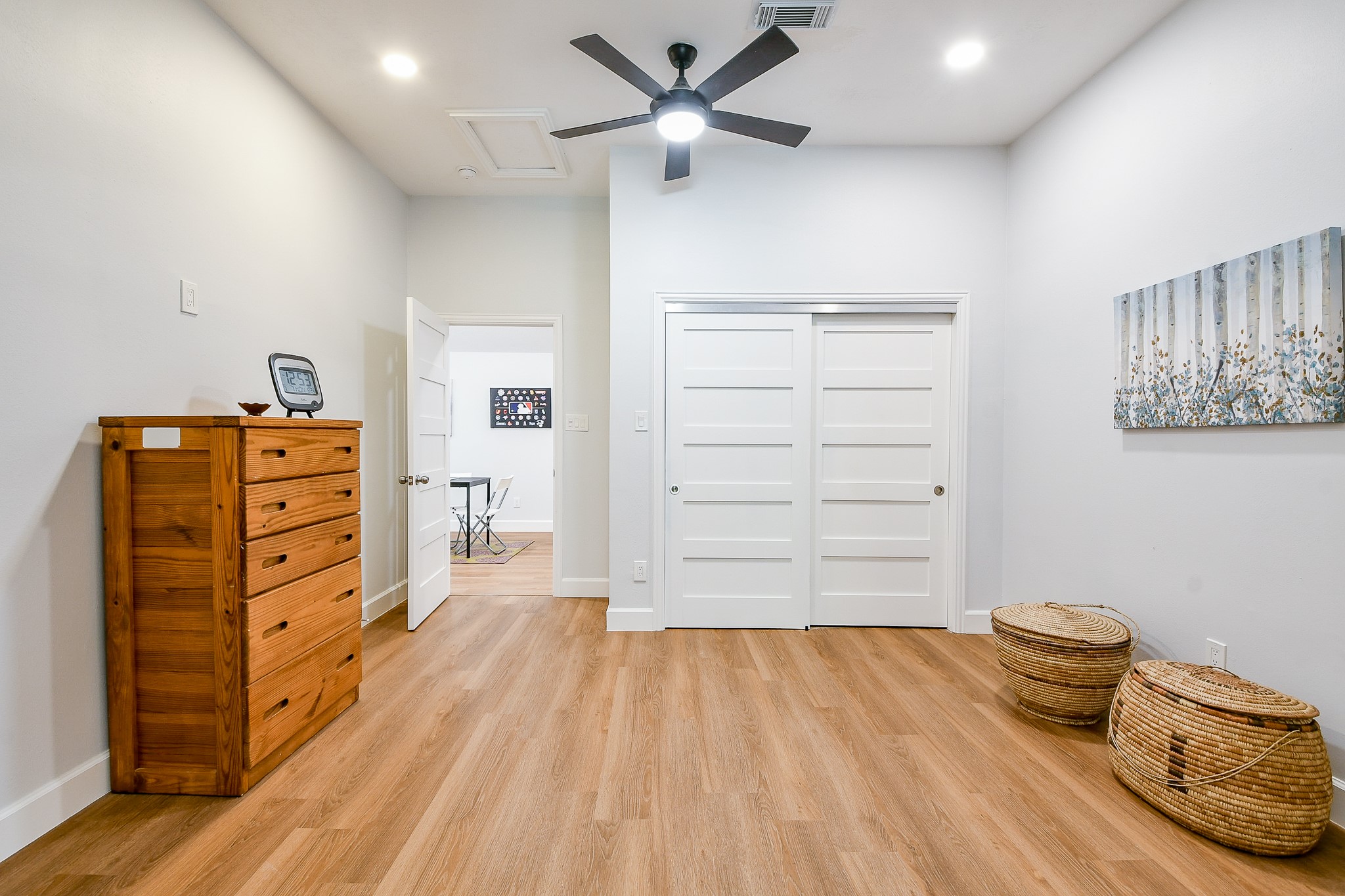 2442 Chimney Rock Road Houston, TX 77057 - Photo 48 of 50 a bedroom with a bed and a dresser