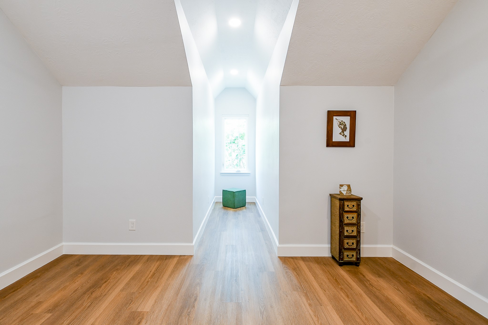 2442 Chimney Rock Road Houston, TX 77057 - Photo 49 of 50 a view of an empty room with wooden floor