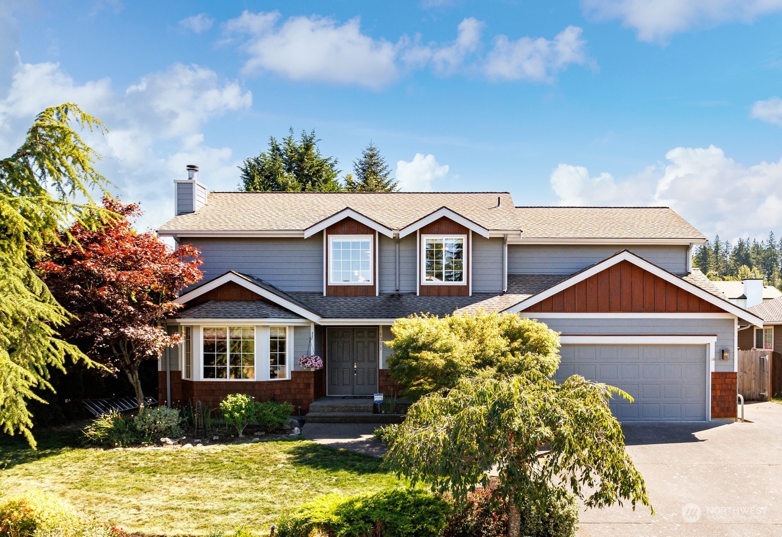 1311 Roma Road Bellingham, WA 98226 - Photo 1 of 38 a front view of a house with a yard