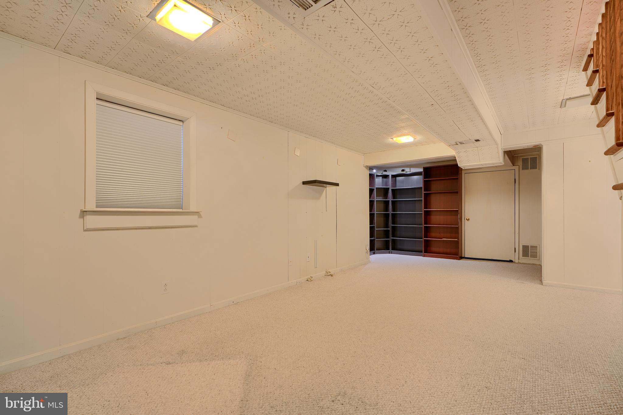 9715 Saxony Road Silver Spring, MD 20910 - Photo 20 of 31 a view of an empty room with closet