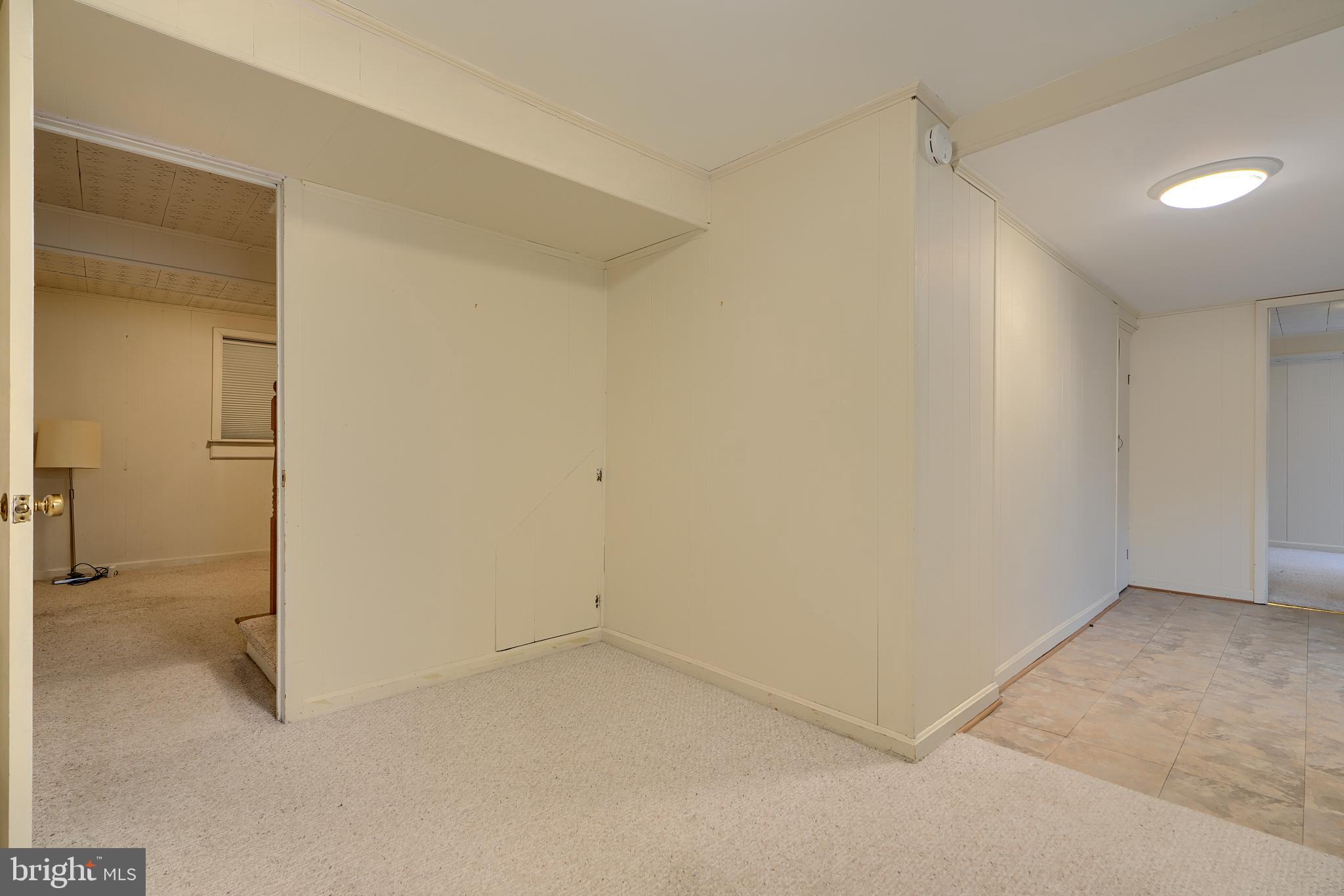 9715 Saxony Road Silver Spring, MD 20910 - Photo 24 of 31 wooden floor in an empty room