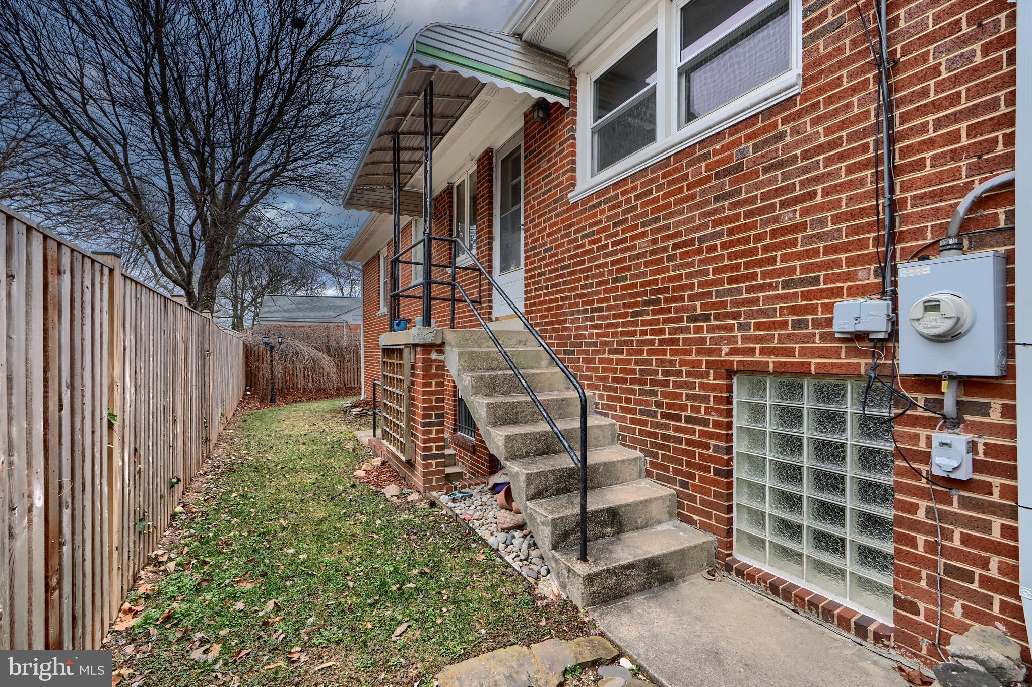 9715 Saxony Road Silver Spring, MD 20910 - Photo 3 of 31 a backyard of a house with lots of green space