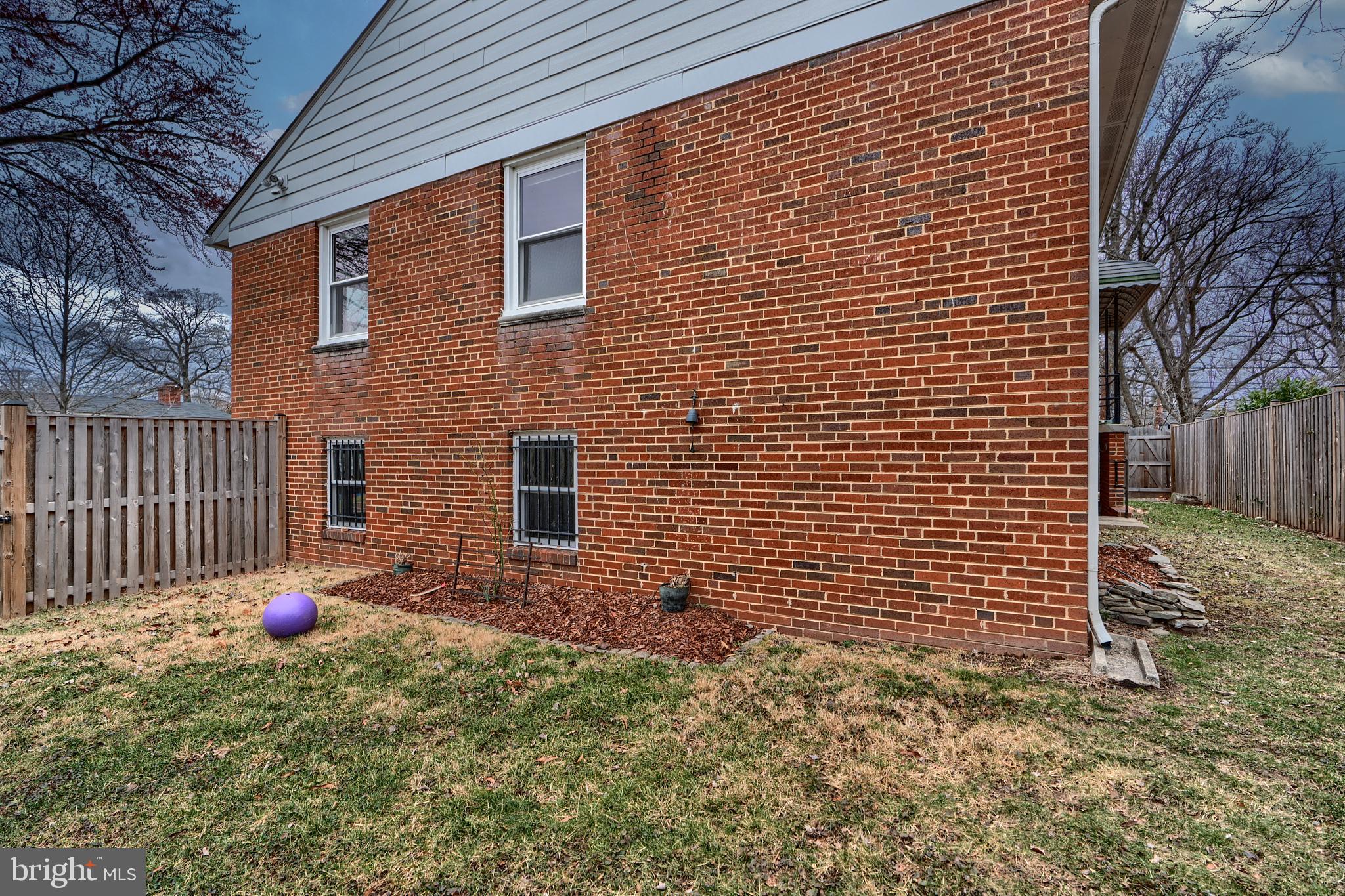 9715 Saxony Road Silver Spring, MD 20910 - Photo 4 of 31 a backyard of a house with garden
