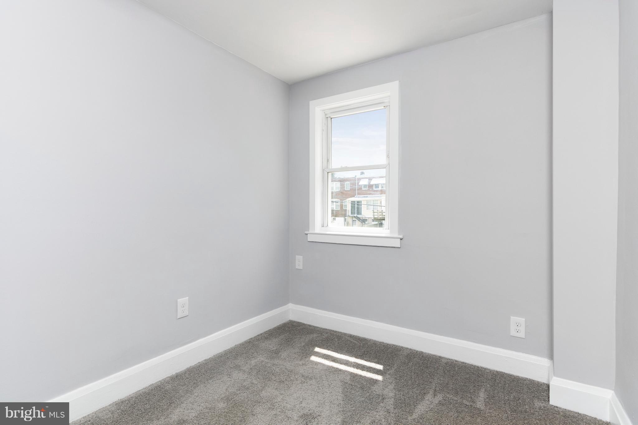 209 West Meadow Road Baltimore, MD 21225 - Photo 11 of 29 an empty room with windows