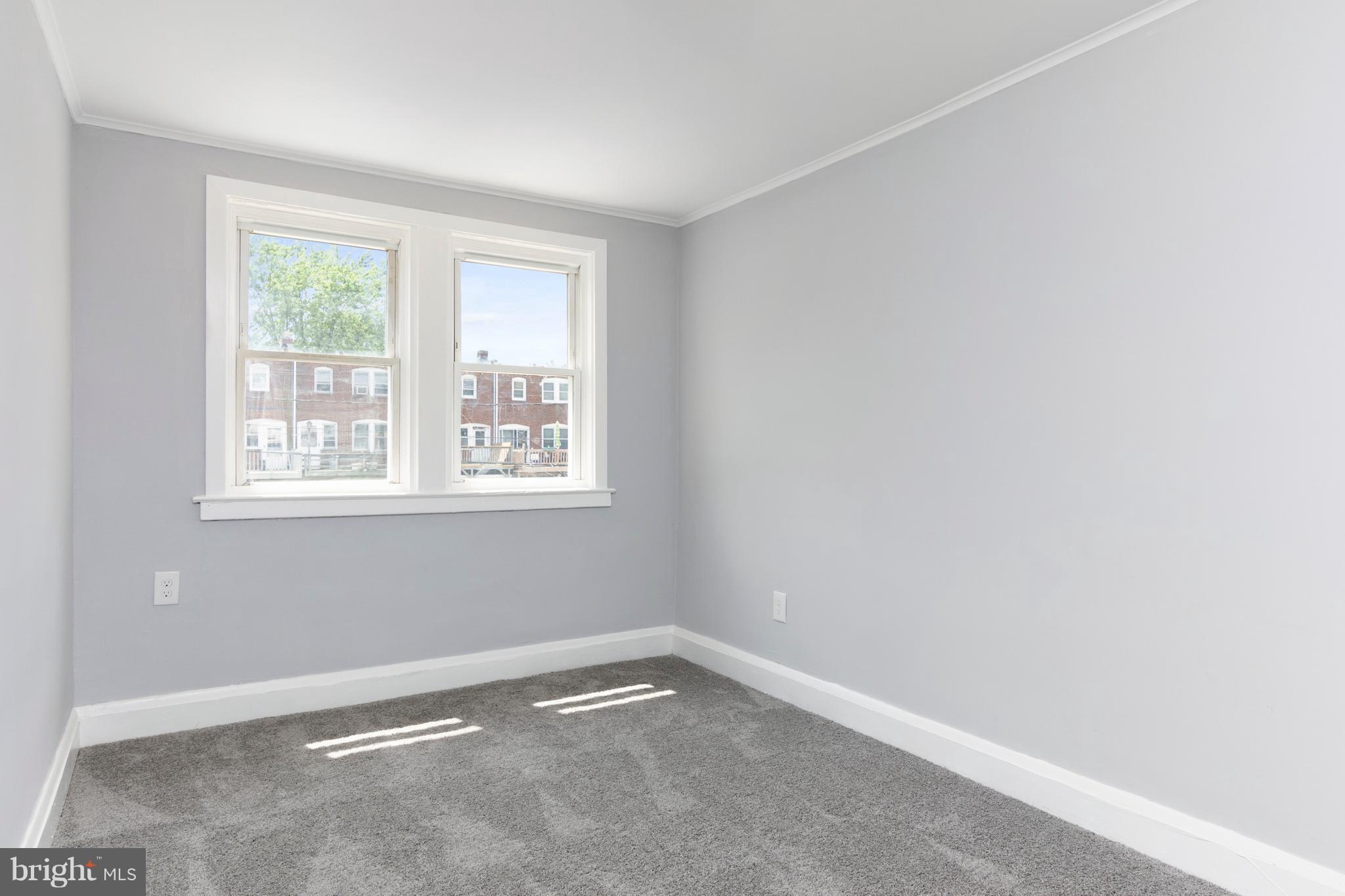 209 West Meadow Road Baltimore, MD 21225 - Photo 15 of 29 an empty room with a window
