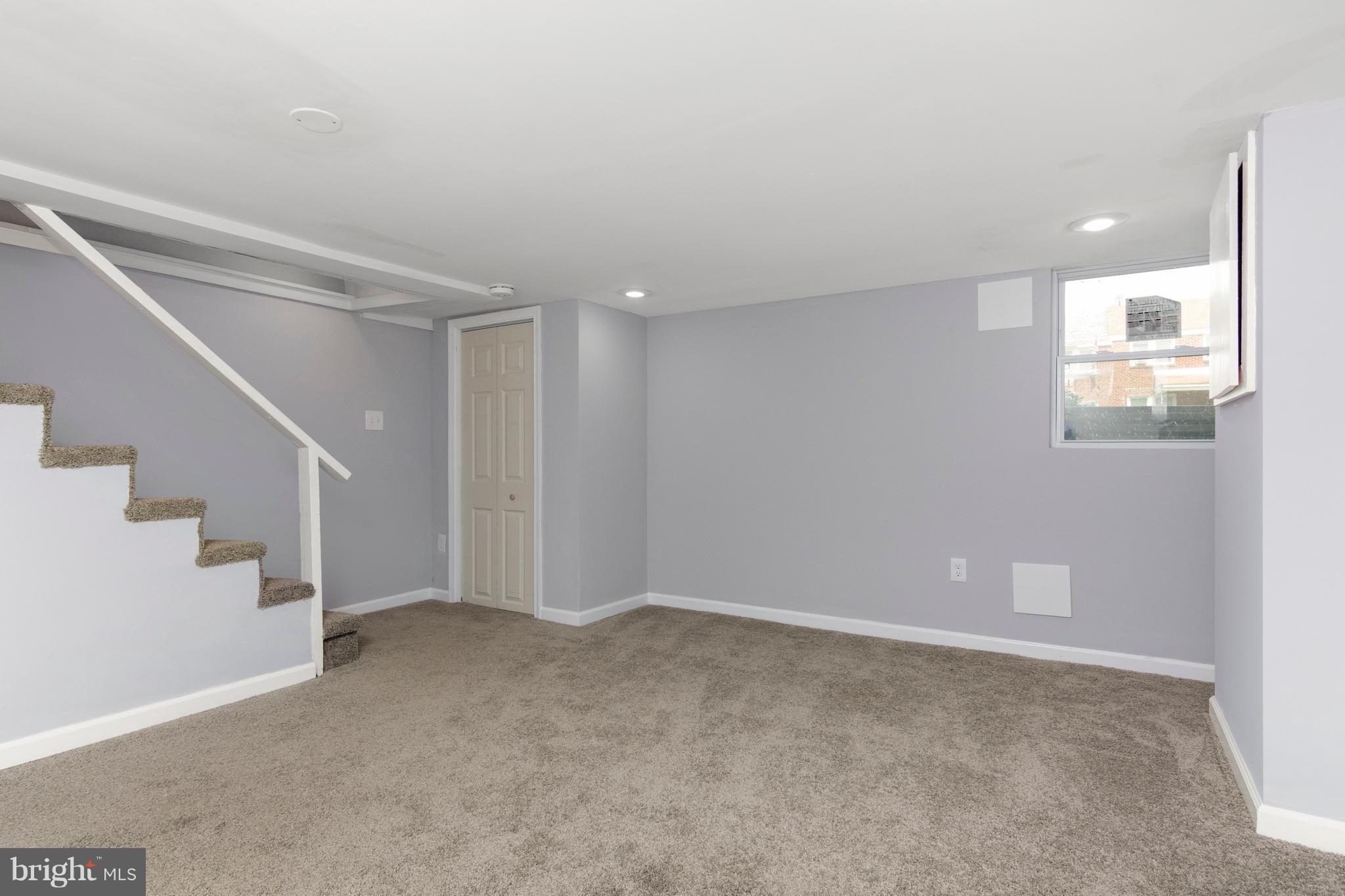 209 West Meadow Road Baltimore, MD 21225 - Photo 24 of 29 a view of an empty room with a window