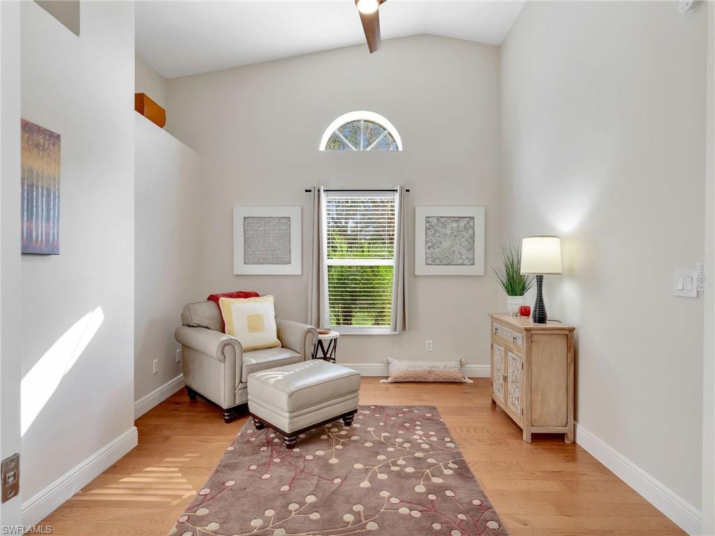 2214 Stacil Circle, Unit 27 Naples, FL 34109 - Photo 25 of 39 a living room with furniture and a window