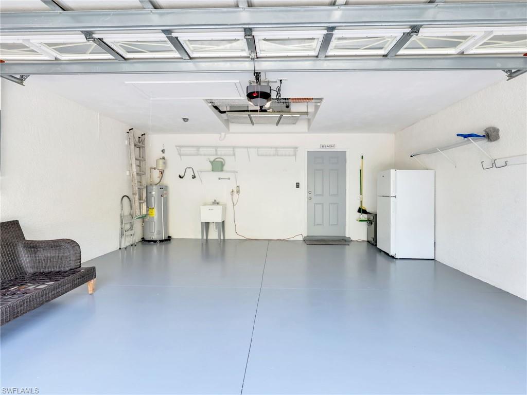 2214 Stacil Circle, Unit 27 Naples, FL 34109 - Photo 35 of 39 a view of kitchen with furniture and ceiling fan