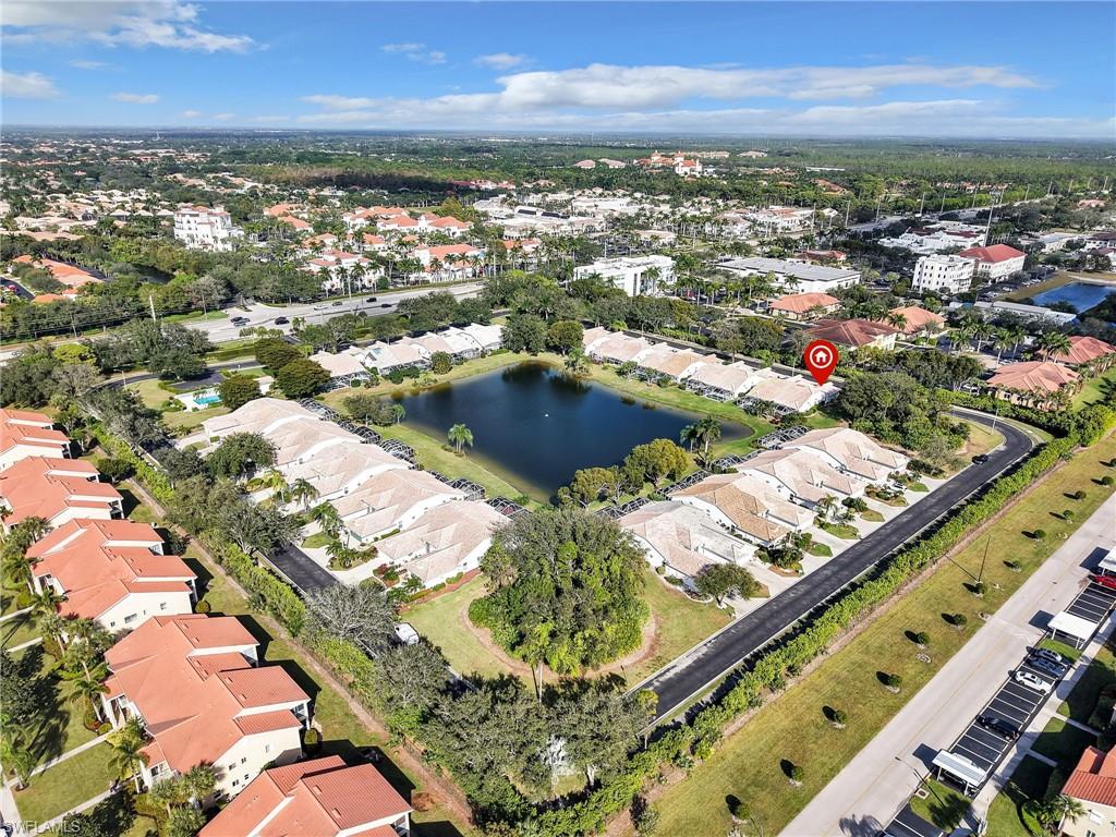 2214 Stacil Circle, Unit 27 Naples, FL 34109 - Photo 38 of 39 an aerial view of residential houses with outdoor space