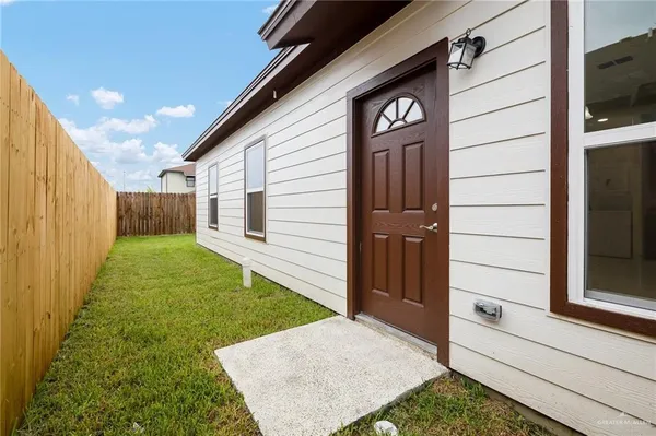 a view of a back yard of the house