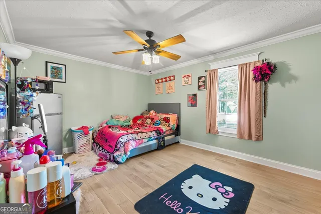 a bedroom with furniture and a couch