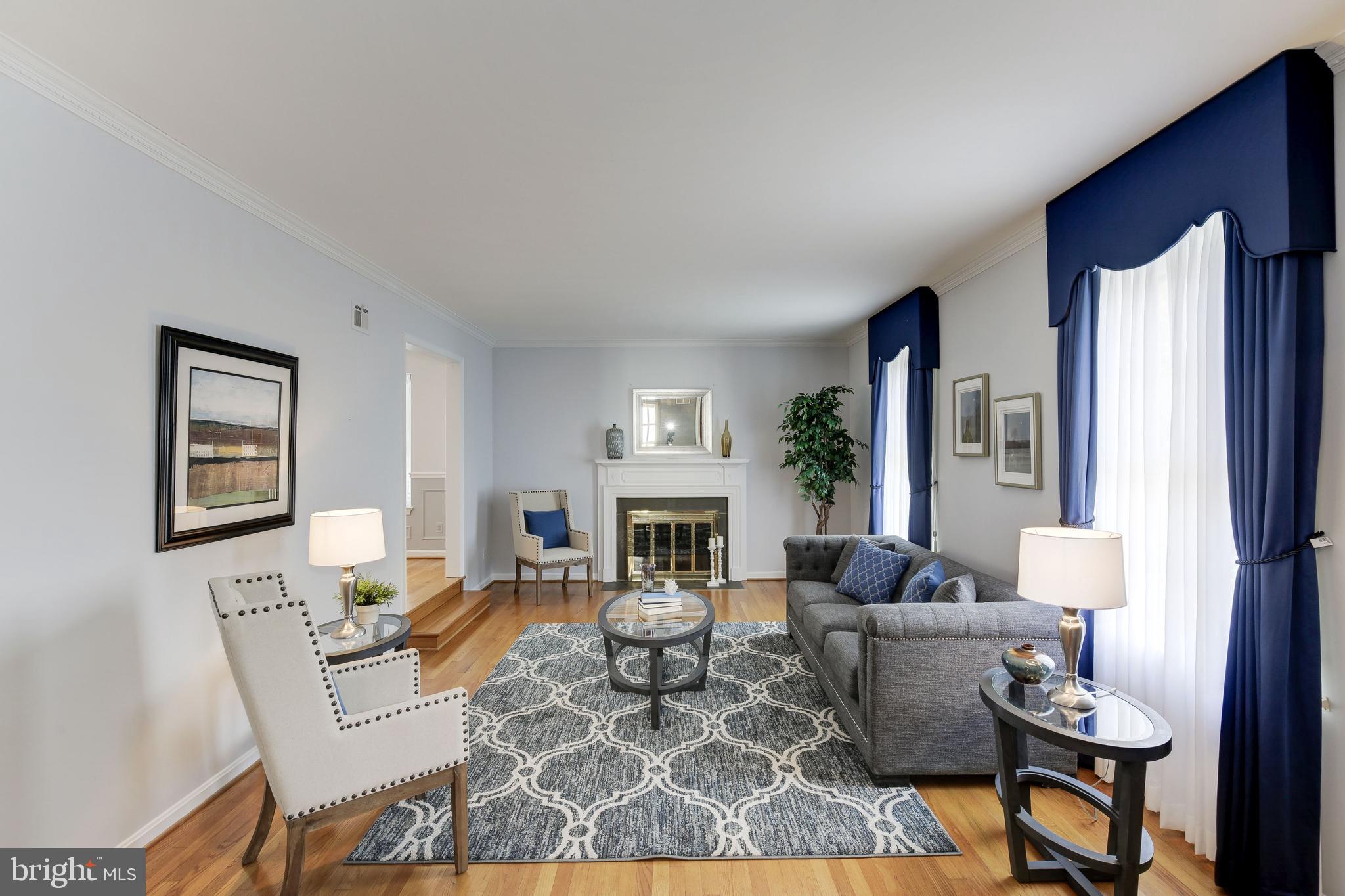 4709 River Road Bethesda, MD 20816 - Photo 12 of 52 Formal Living room with wood burning fireplace