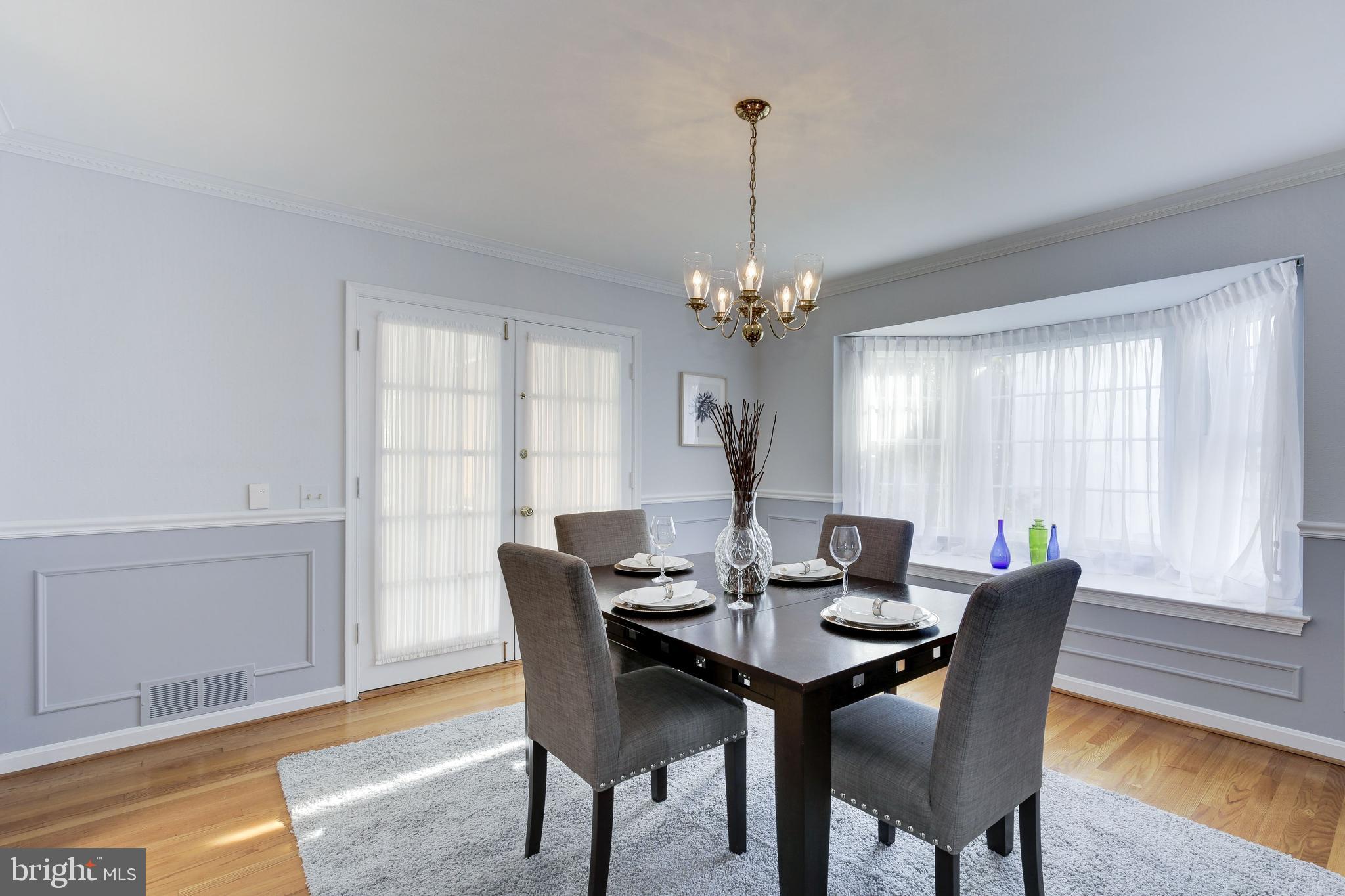 4709 River Road Bethesda, MD 20816 - Photo 18 of 52 Dining room bay window and French doors to Porch
