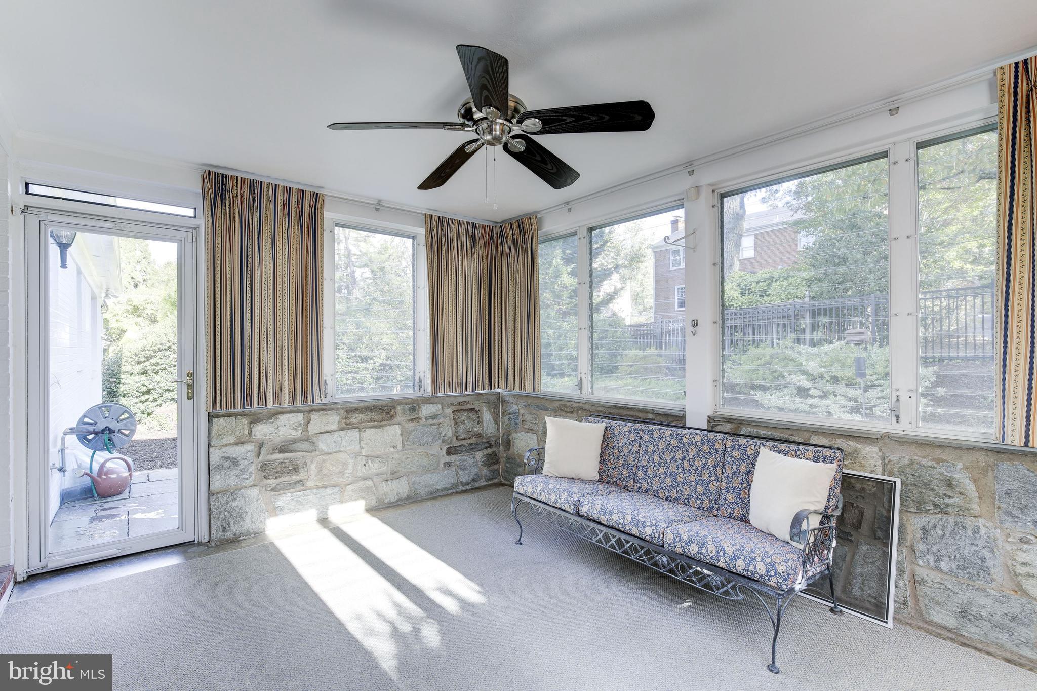 4709 River Road Bethesda, MD 20816 - Photo 22 of 52 Enclosed Porch with access to Patio , rear gardens