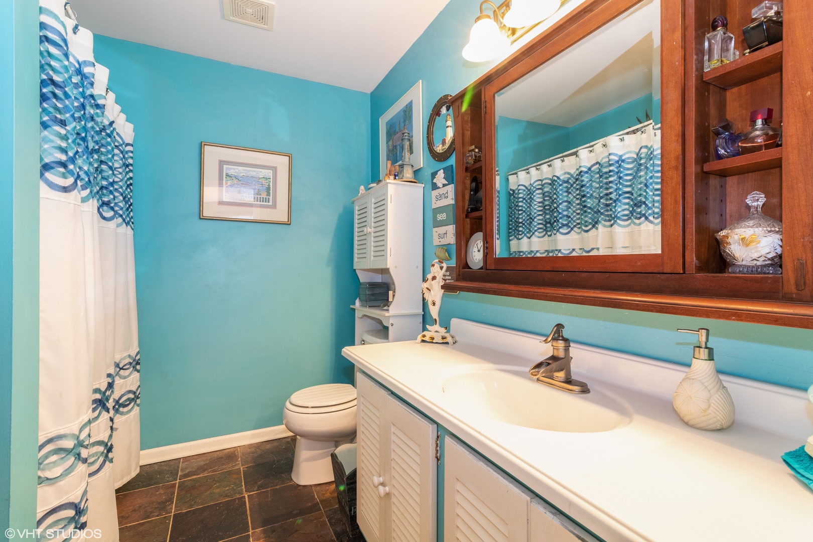 53 Braxton Lane, Unit 53 Aurora, IL 60504 - Photo 12 of 17 a bathroom with a sink toilet and window