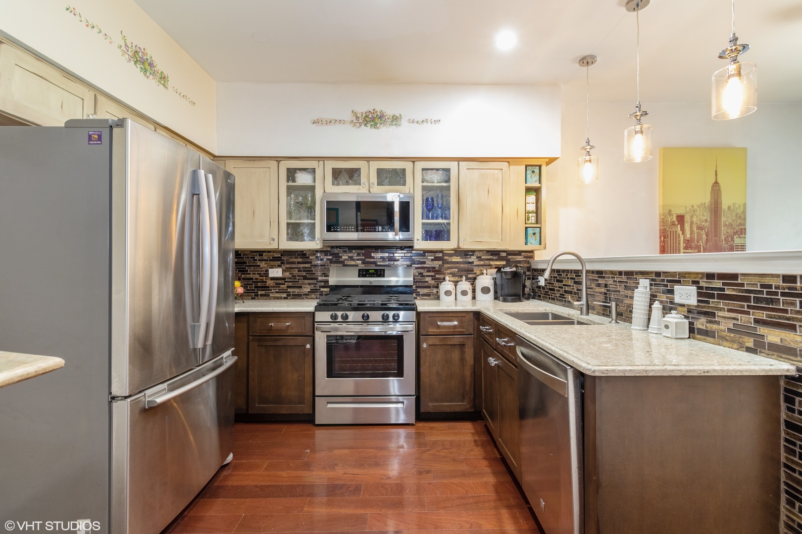 53 Braxton Lane, Unit 53 Aurora, IL 60504 - Photo 6 of 17 a kitchen with stainless steel appliances granite countertop a sink stove and refrigerator