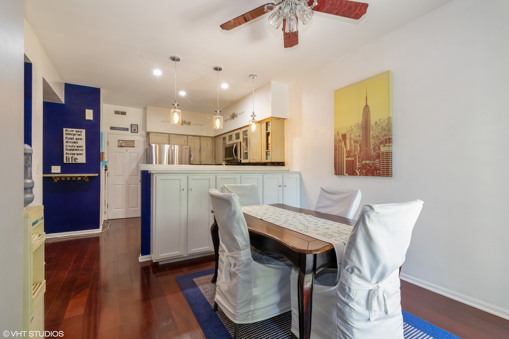 53 Braxton Lane, Unit 53 Aurora, IL 60504 - Photo 8 of 17 a view of a dining room with furniture and wooden floor