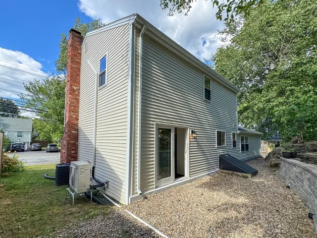 a view of backyard of the house