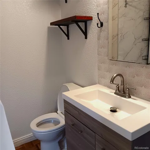a bathroom with a shower and a bath tub