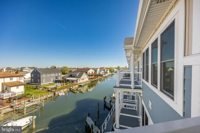 a view of a balcony with ocean view