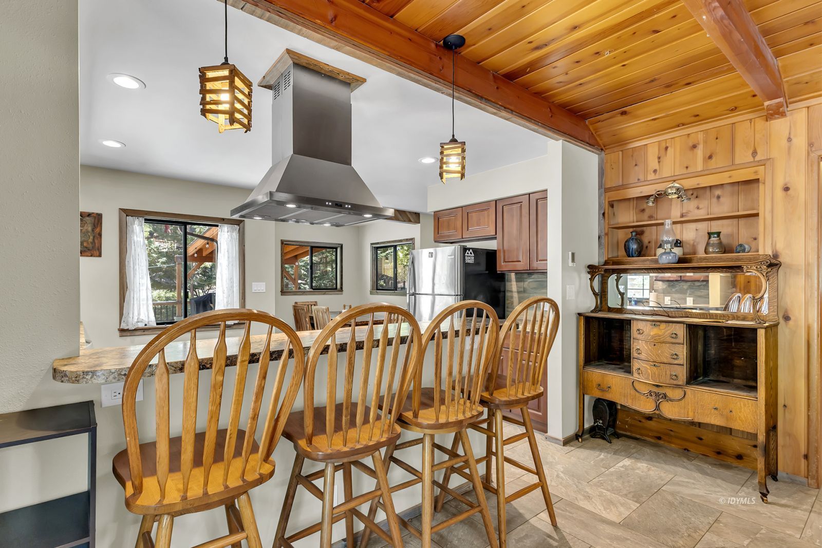 55175 John Muir Road, Unit CALIFO Idyllwild, CA 92549 - Photo 12 of 51 Bookshelf area + barchairs