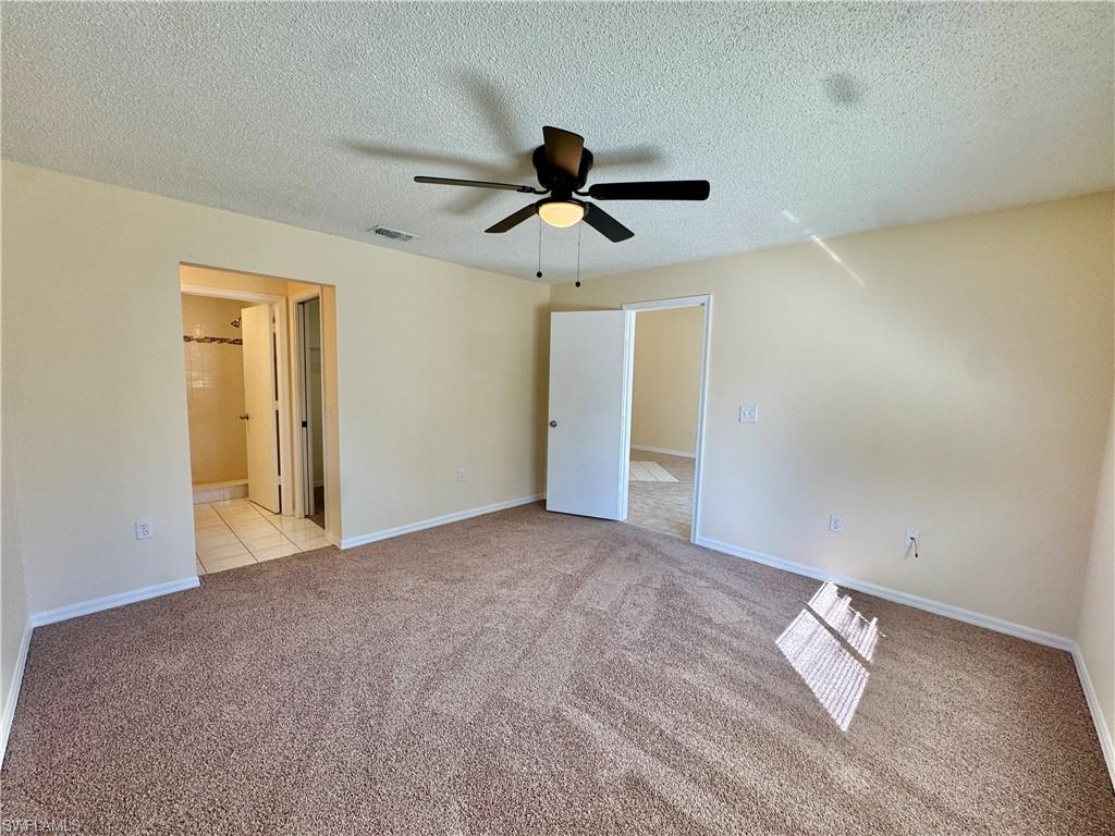5665 Whitaker Road, Unit A201 Naples, FL 34112 - Photo 6 of 30 a view of empty room