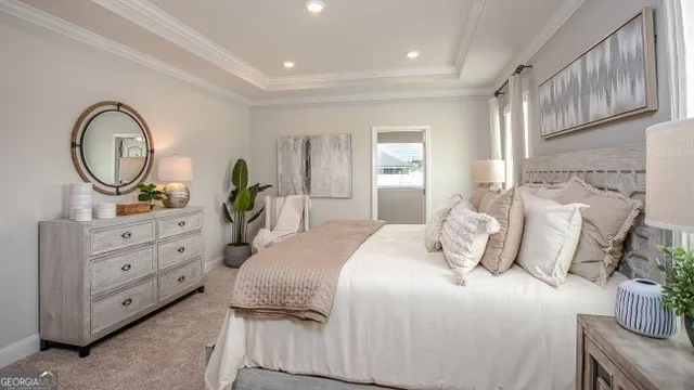 a bedroom with bed and a window