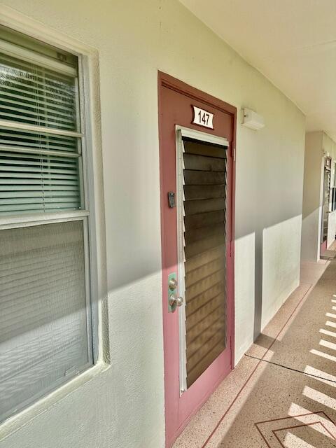 147 Fanshaw D Boca Raton, FL 33434 - Photo 2 of 28 Walk Way