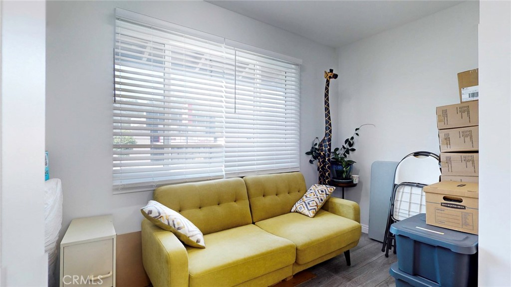 6851 Foothill Boulevard Tujunga, CA 91042 - Photo 19 of 50 a living room with furniture and a window
