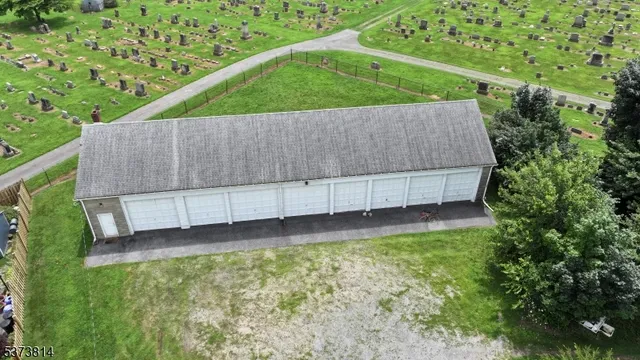 a view of a backyard with a small garden
