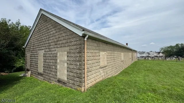 a view of a backyard of the house
