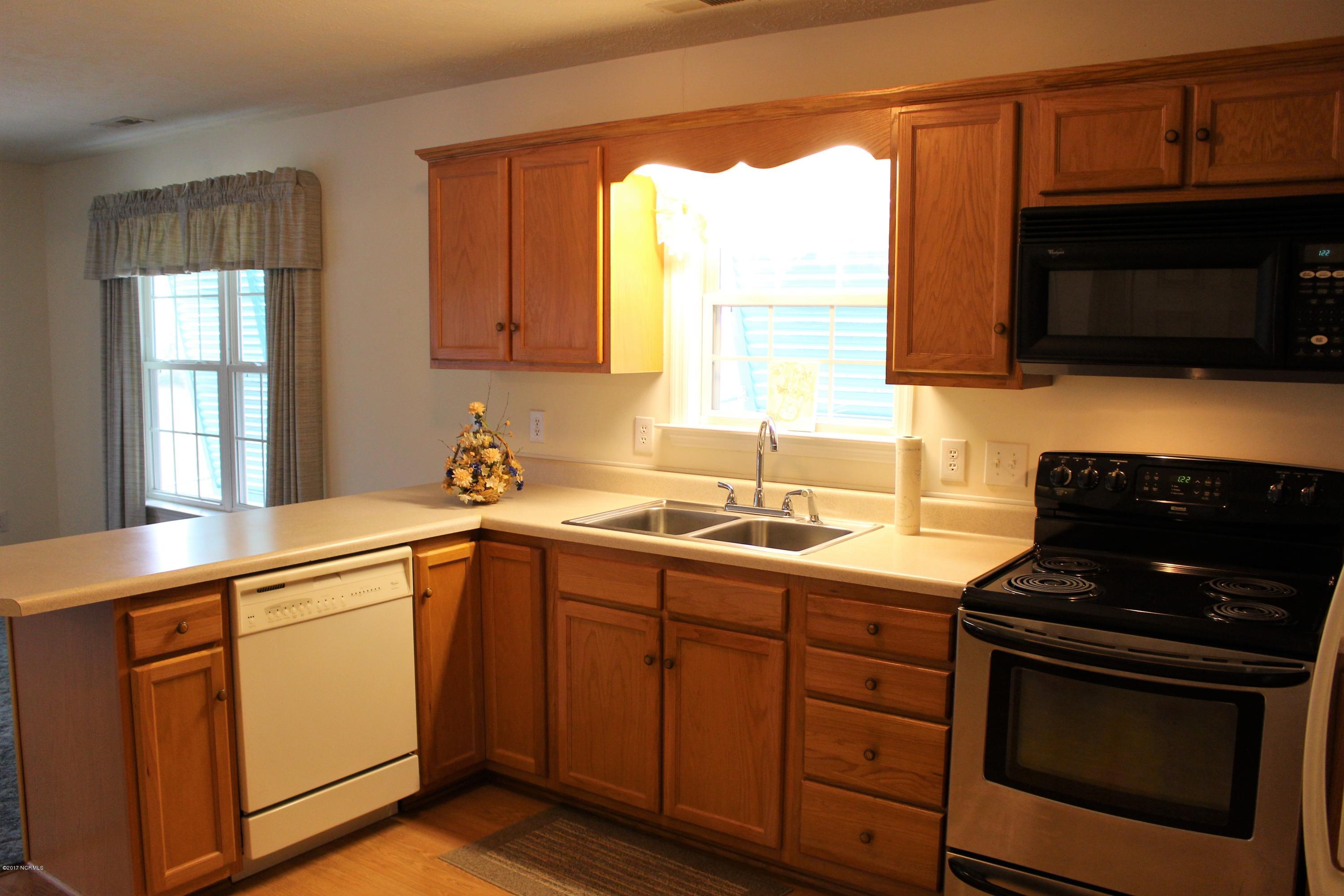 451 Becton Road Havelock, NC 28532 - Photo 39 of 87 Open kitchen with breakfast bar. Stove can also be changed out for gas. Lines already run.