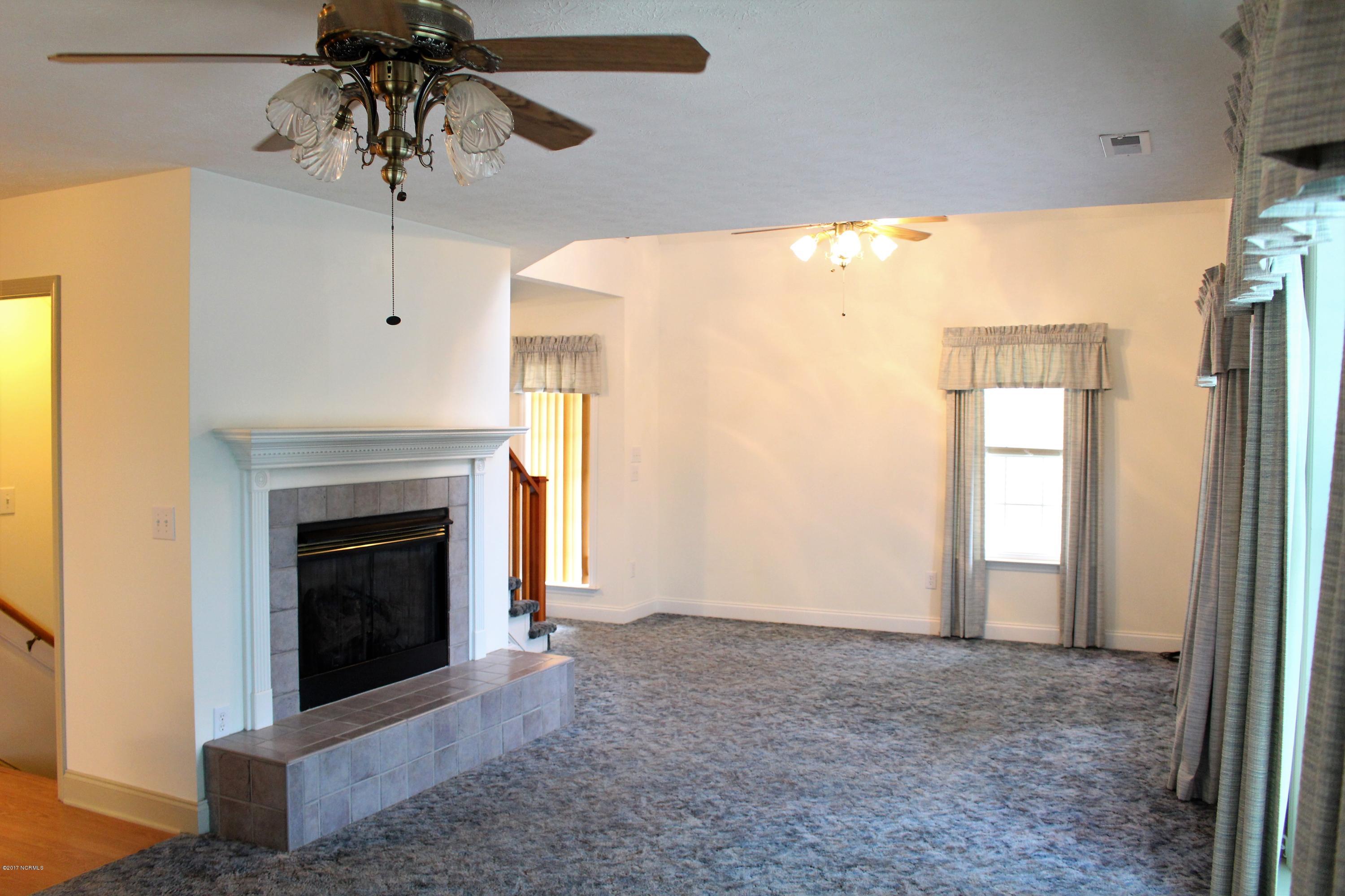 451 Becton Road Havelock, NC 28532 - Photo 47 of 87 Principal level living room with gas log fireplace