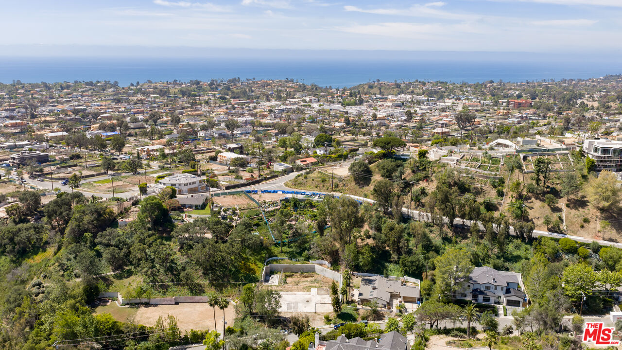 1303 Marinette Road Pacific Palisades, CA 90272 - Photo 3 of 11 an aerial view of multiple house