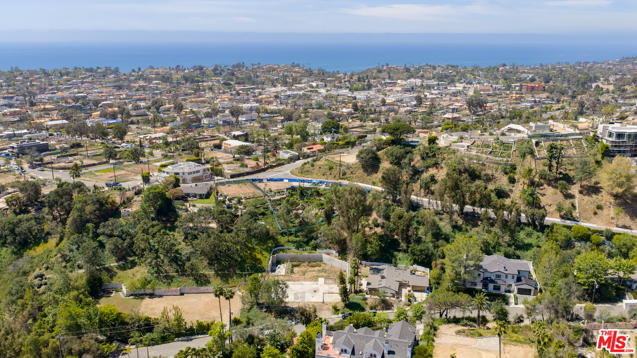 1303 Marinette Road Pacific Palisades, CA 90272 - Photo 4 of 11 an aerial view of multiple house