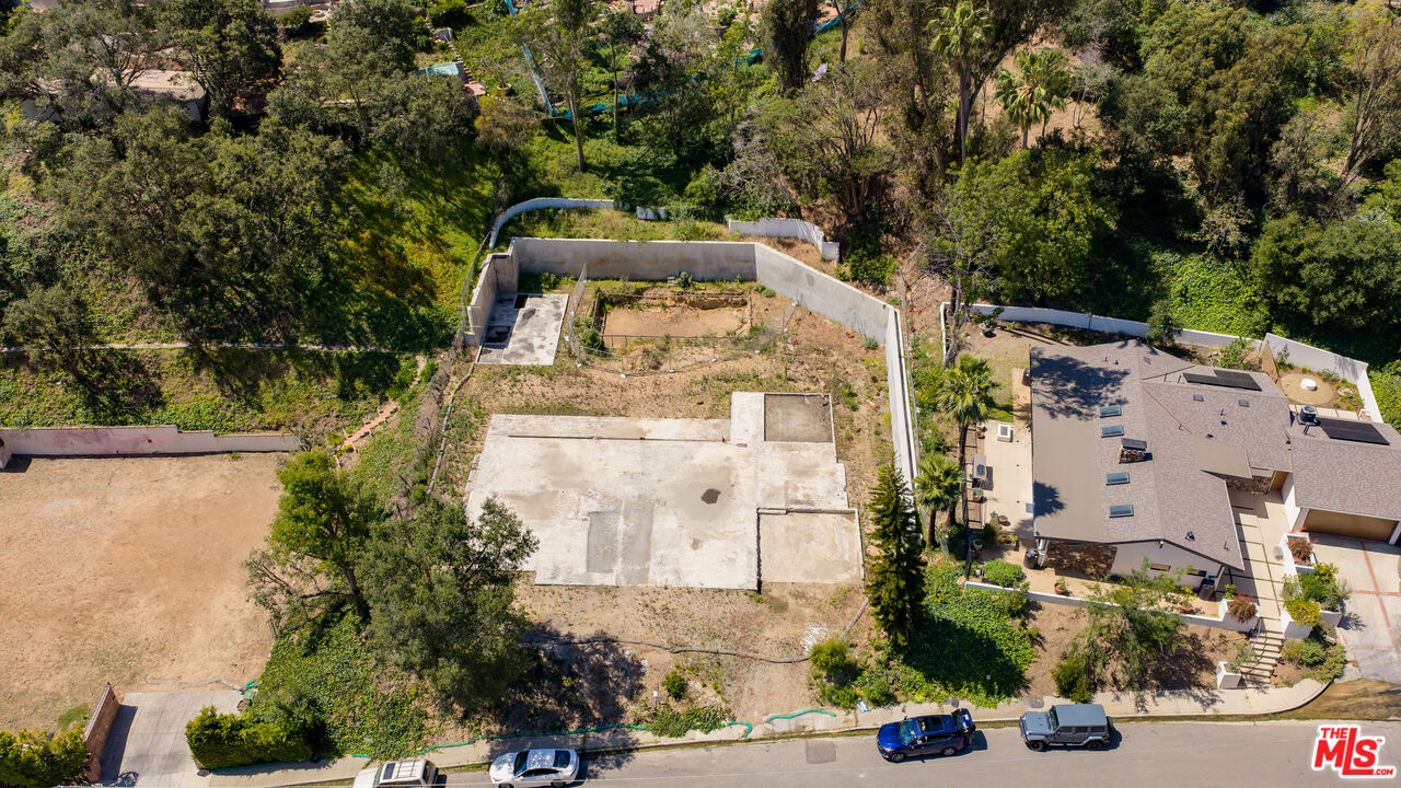 1303 Marinette Road Pacific Palisades, CA 90272 - Photo 5 of 11 an aerial view of a house with outdoor space