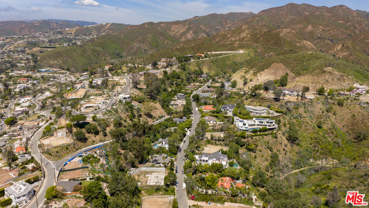 1303 Marinette Road Pacific Palisades, CA 90272 - Photo 7 of 11 view of city and mountain