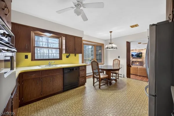 a view of a dining room with furniture