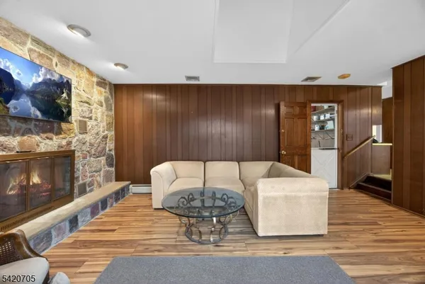 a view of a dining room with furniture and window