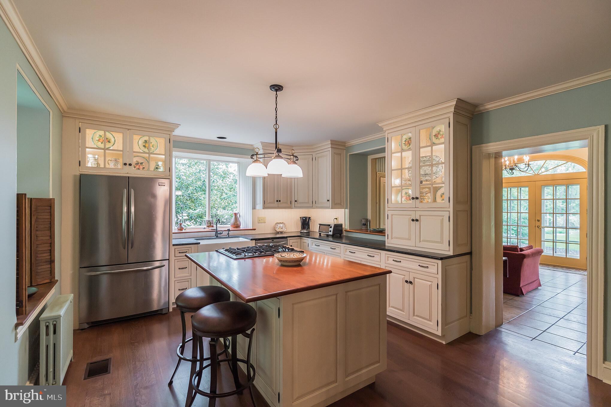 Kitchen & Sunroom beyond